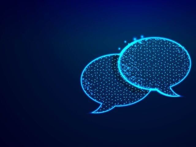 Dialogue Chat clouds Speech bubble icon from lines triangles and particle style design Low poly technology devices people communication concept on blue background