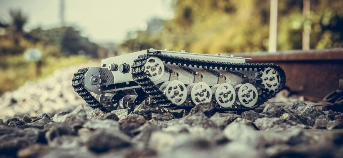 A piece of construction equipment sits on a railroad. (Photo by David Thai).
